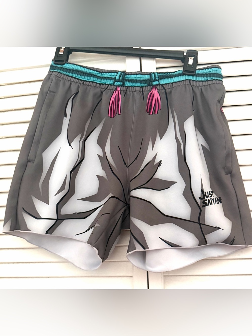 Just Saiyan Anime Skinz Athletic Shorts with Teal Drawstrings and zipped pockets